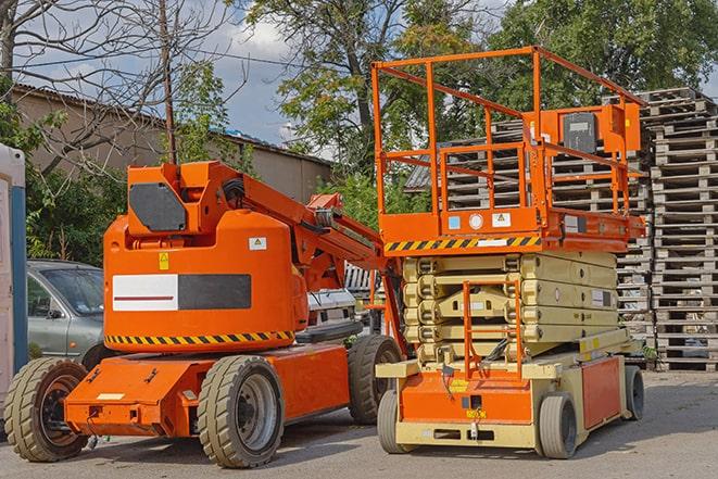 forklift lifting materials in a shipping warehouse in Commerce, CA